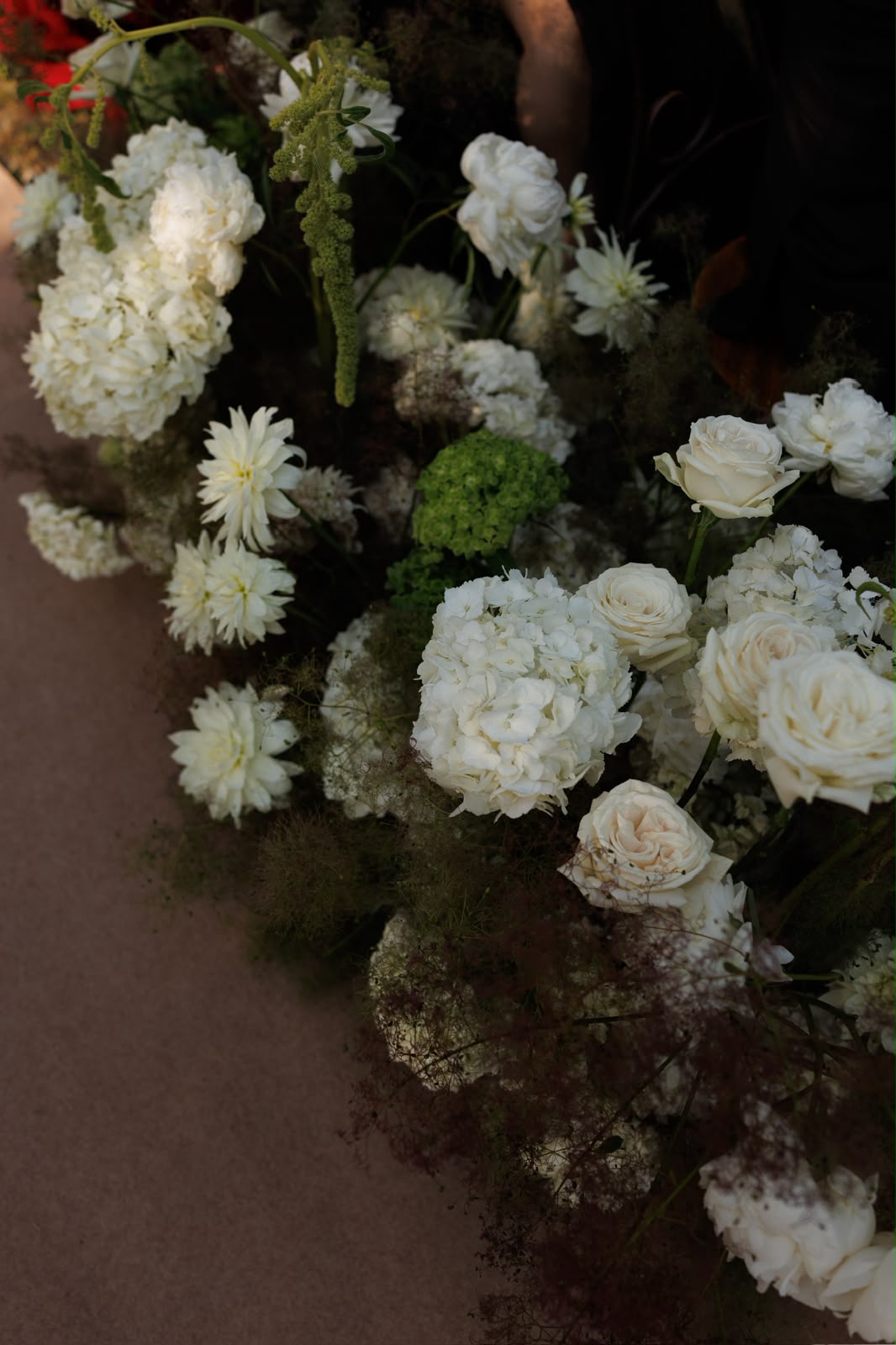 White flowers lining the aisle